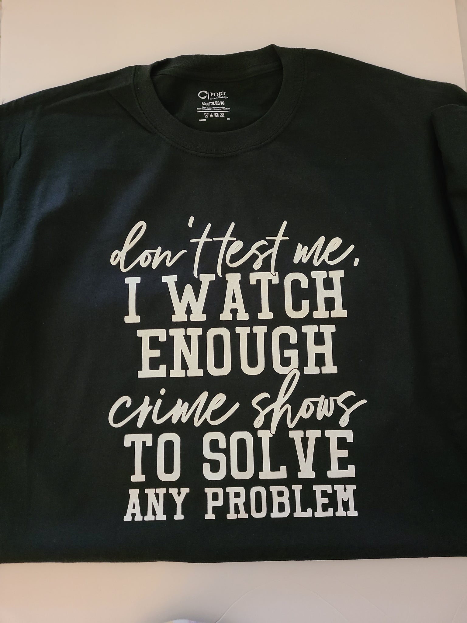 Don't test me, I watch enough crime shows to solve any problems TSHIRT